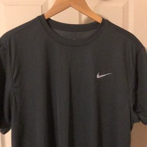 Nike dri-fit men’s running shirt.